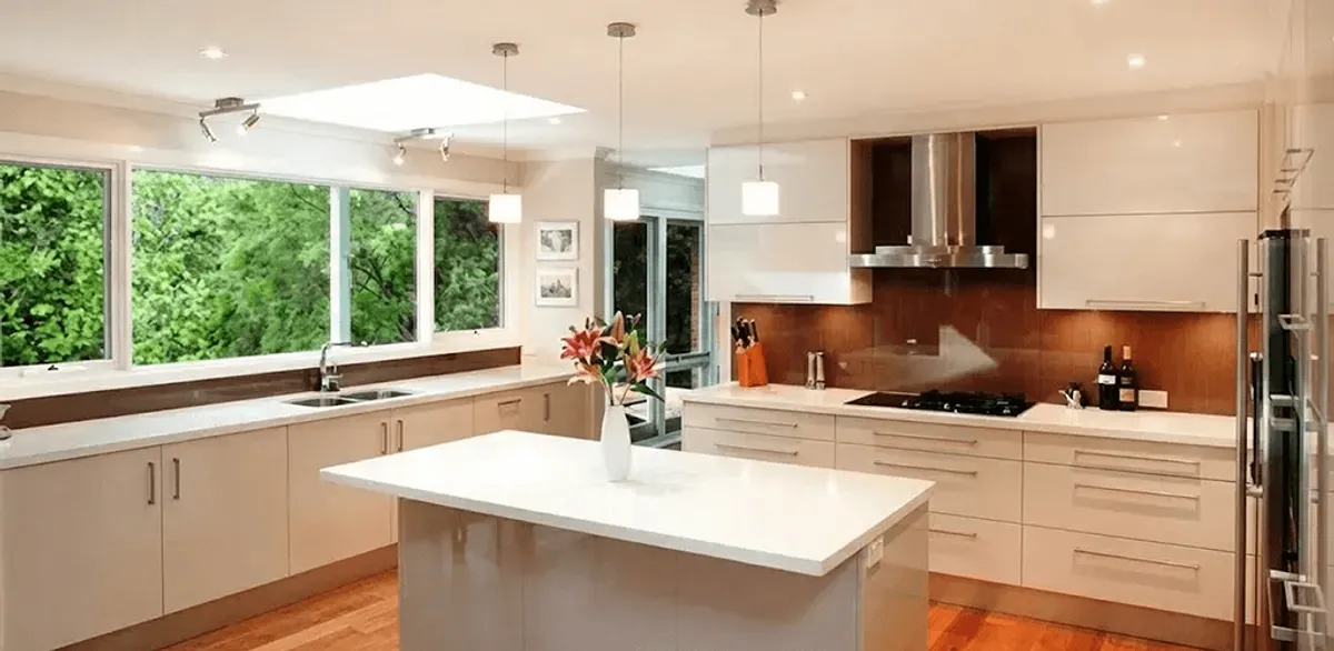 Kitchen cabinet refacing and remodel results in a modern kitchen in Worcester, MA