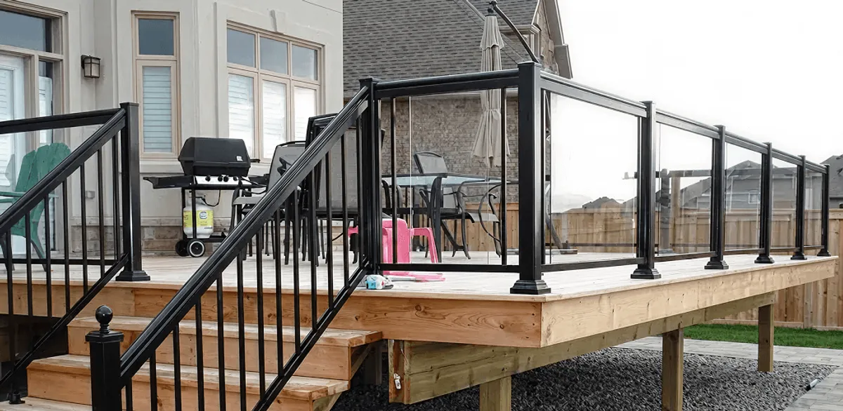 Handrail installation on a deck staircase for safety and code compliance in Worcester, MA