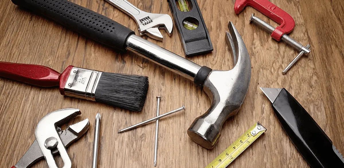 Handyman tools laid out for home repair and maintenance work in Worcester, MA