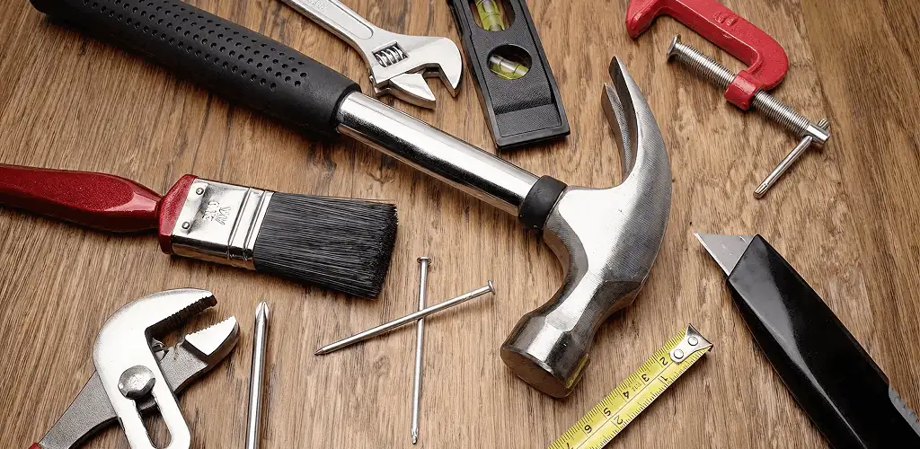 Handyman tools laid out for home repair and maintenance work in Worcester, MA
